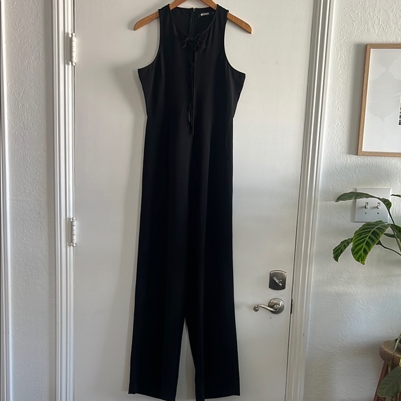 Missguided Black jumpsuit with lace up front size 12 - Picture 5 of 14